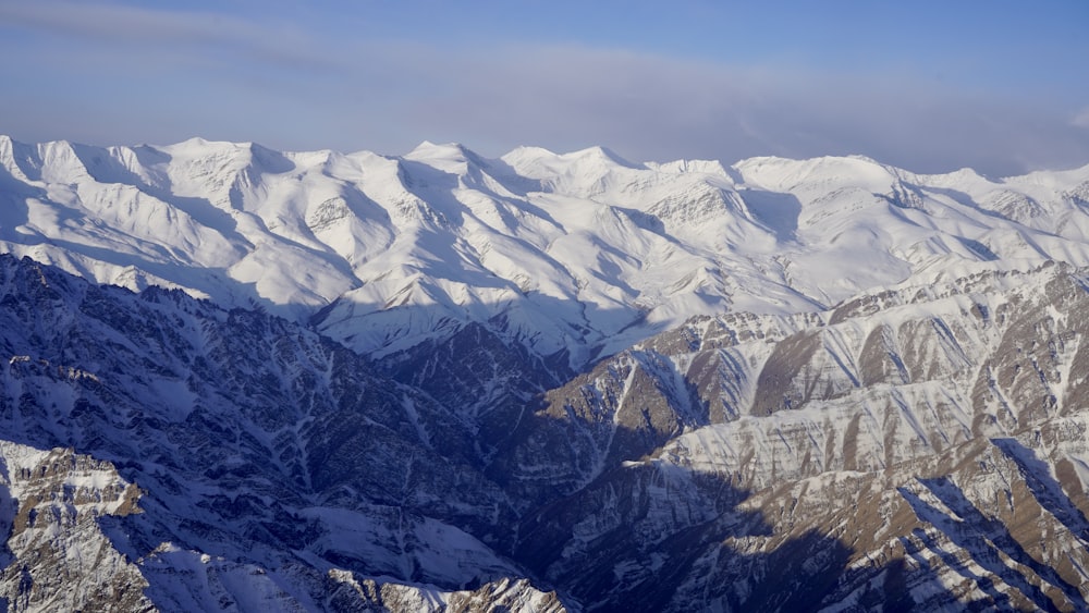 snow covered mountains during daytime