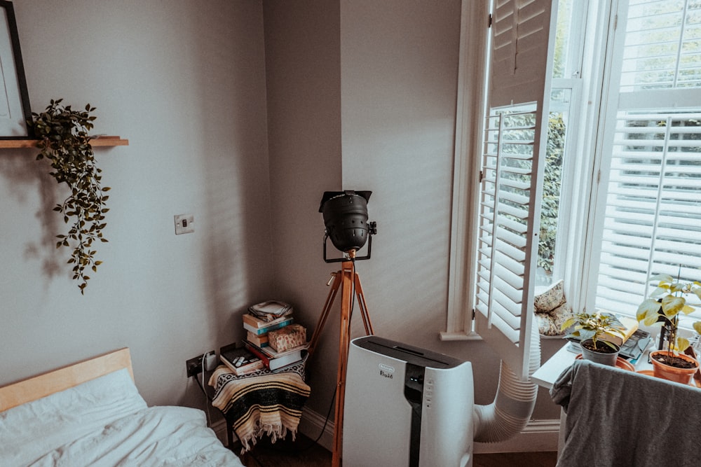 black and orange camera tripod