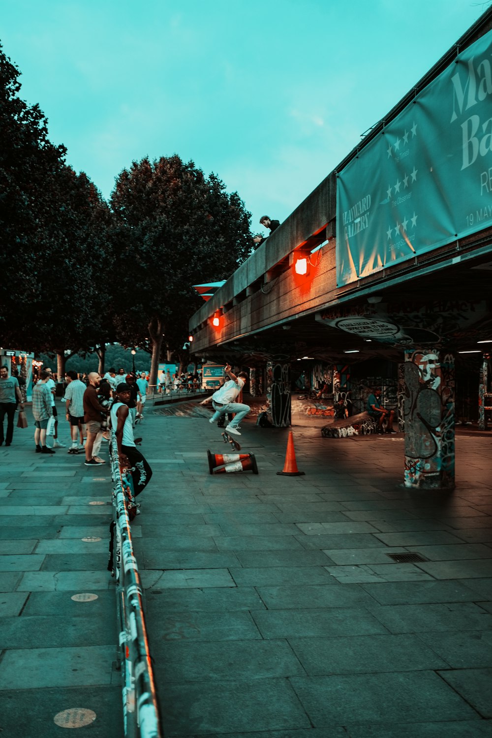 people walking on street during night time