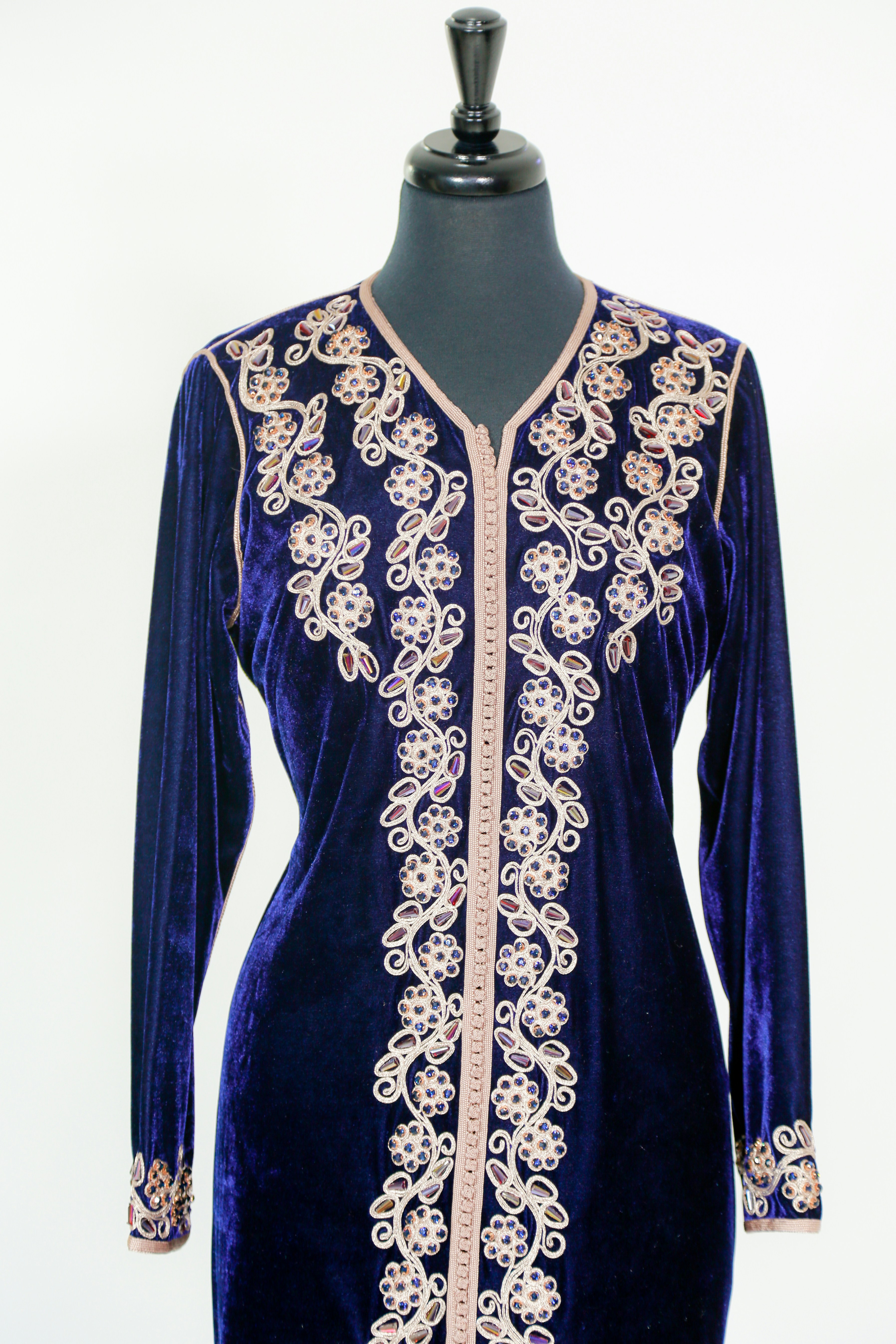 A diverse group of fashion designers collaborating.