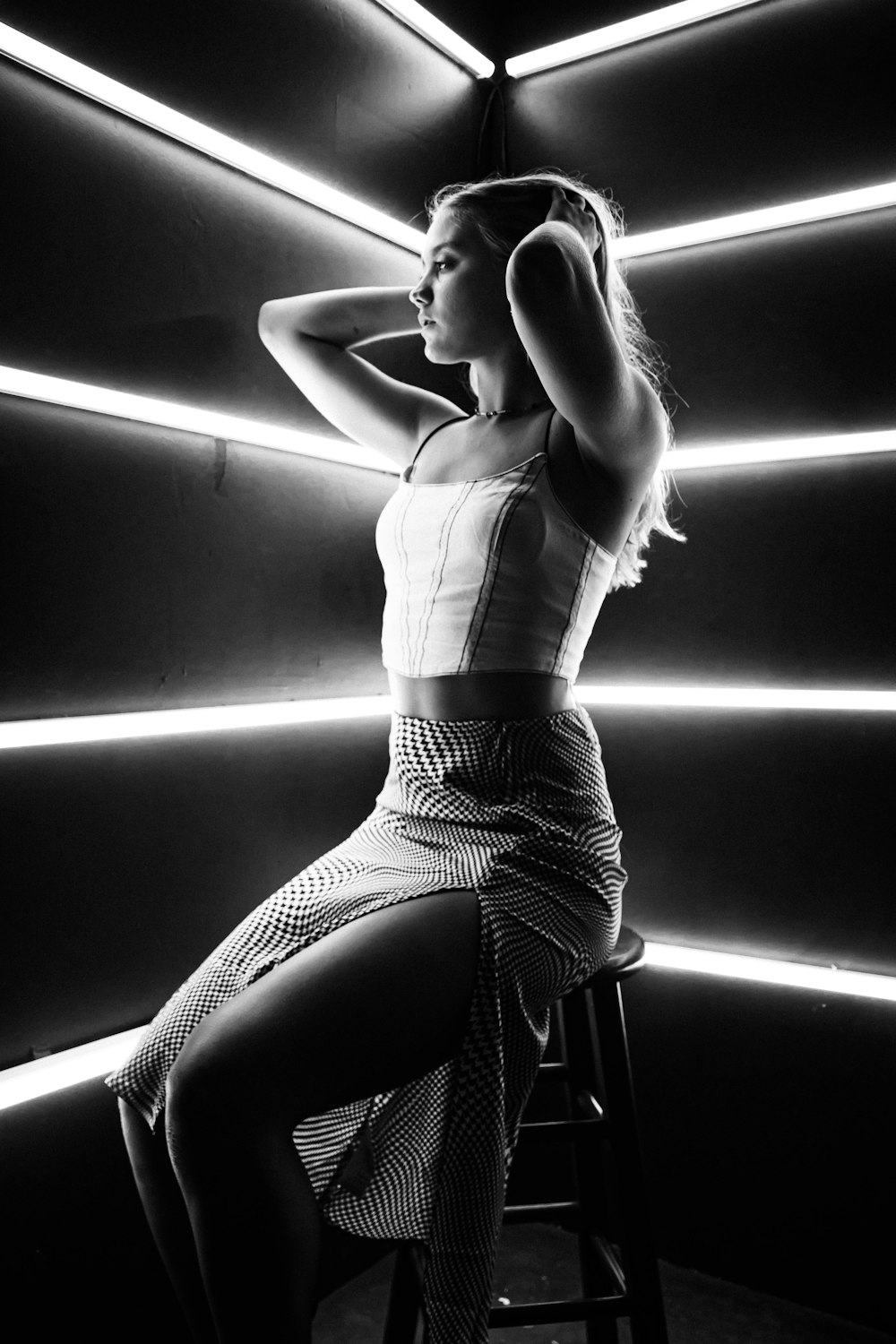 woman in white dress sitting on floor