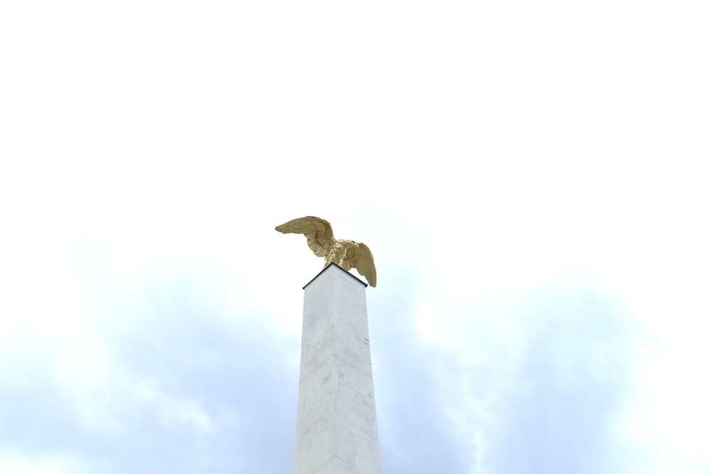 gray concrete tower under gray sky