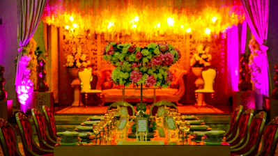 red and yellow flowers on brown wooden table