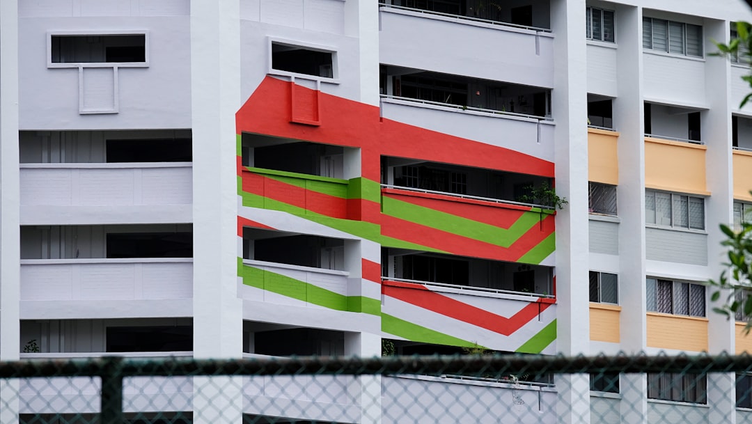 white red and black concrete building