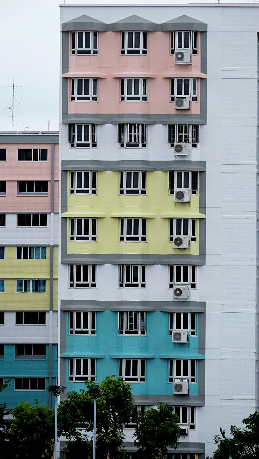 white blue and pink concrete building