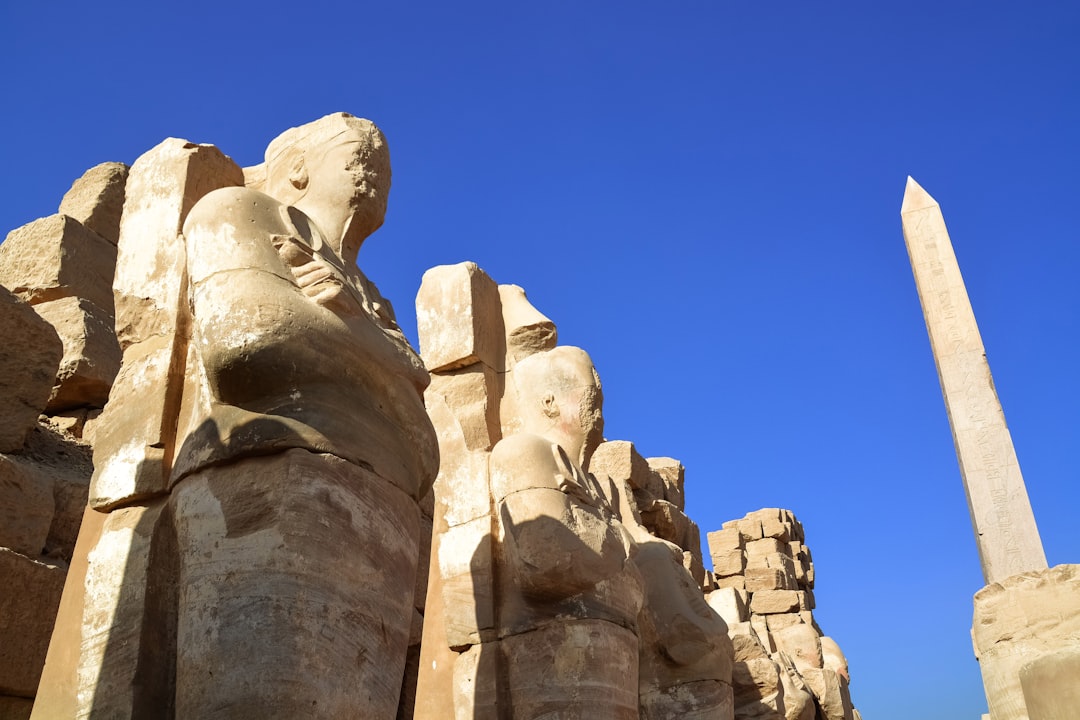 brown rock formation under blue sky during daytime