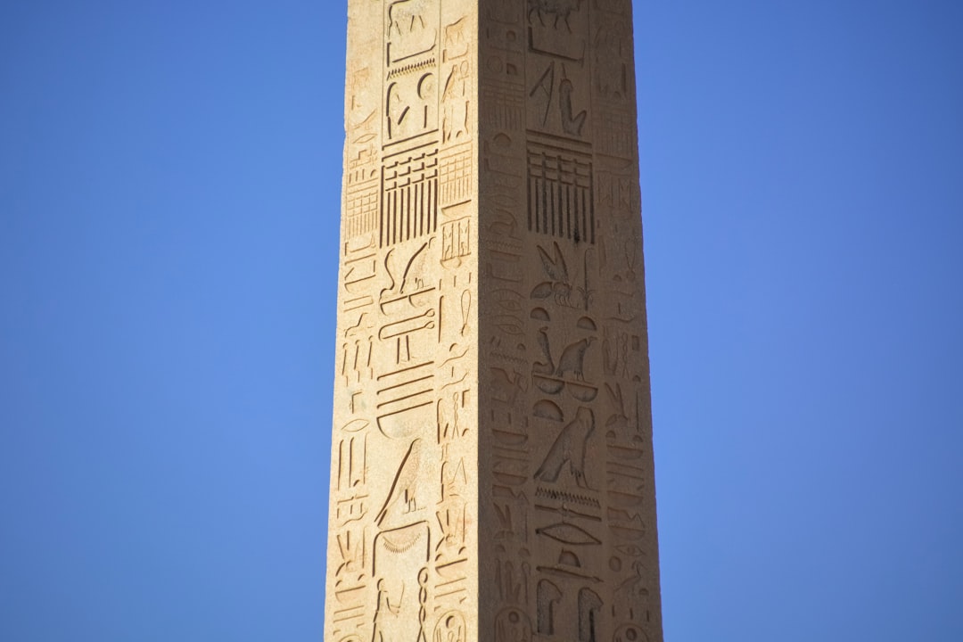 gray concrete tower under blue sky during daytime