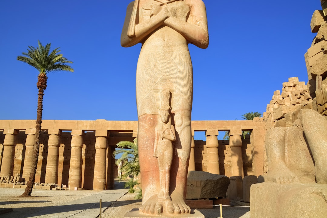 brown concrete statue during daytime