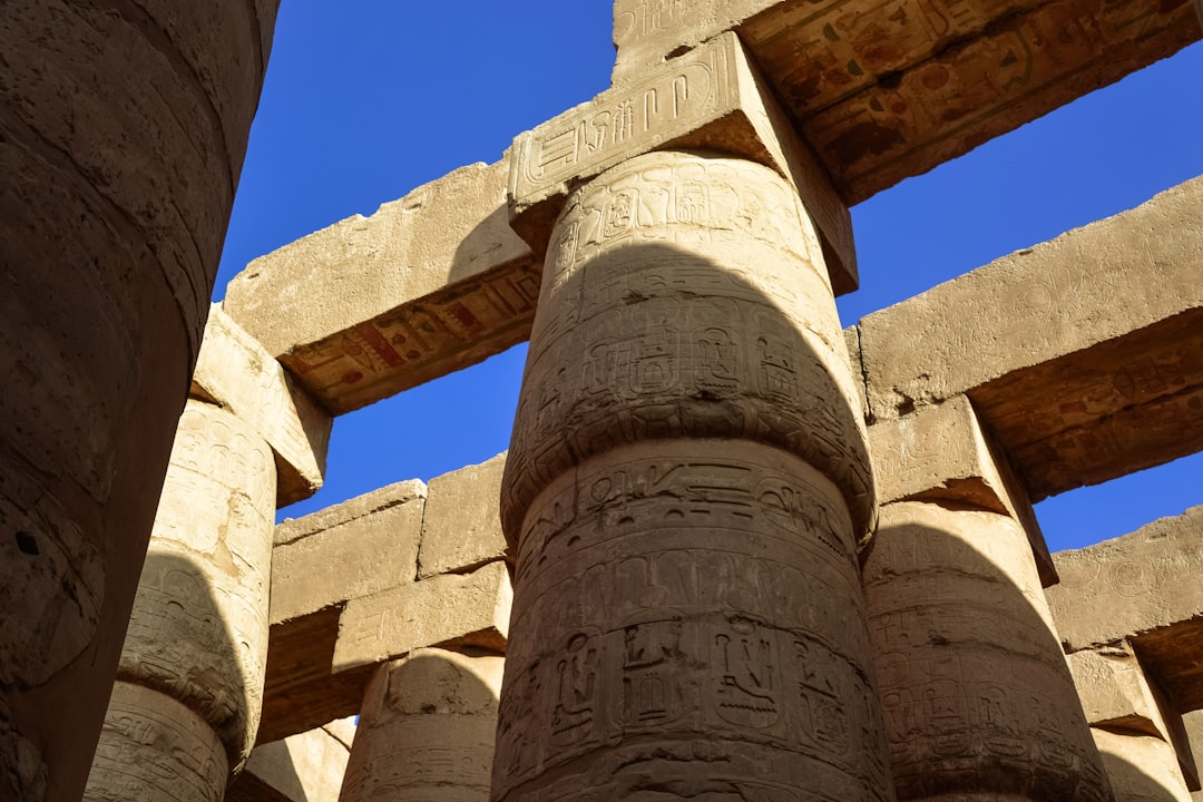 brown concrete tower under blue sky during daytime