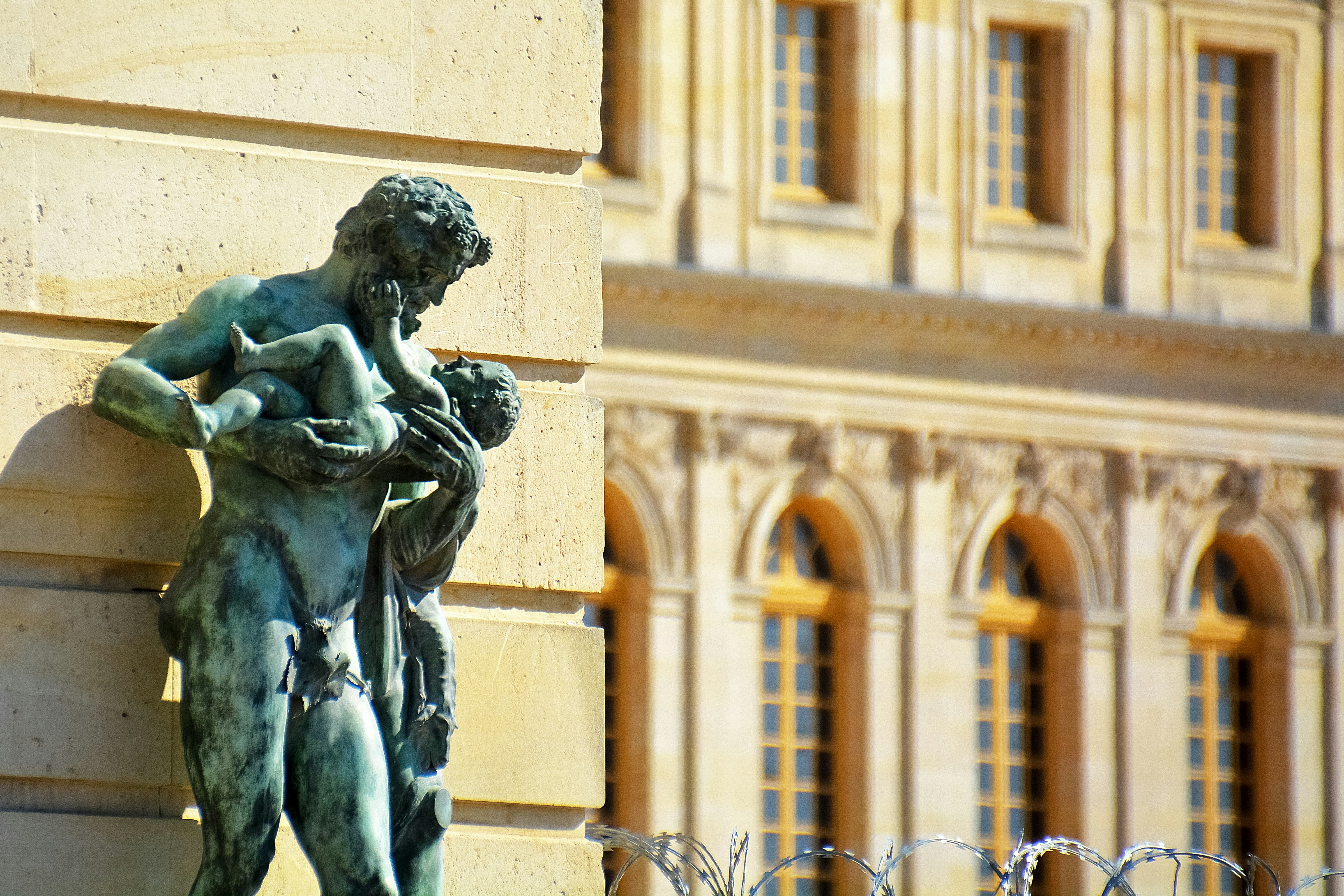 man riding horse statue near building during daytime