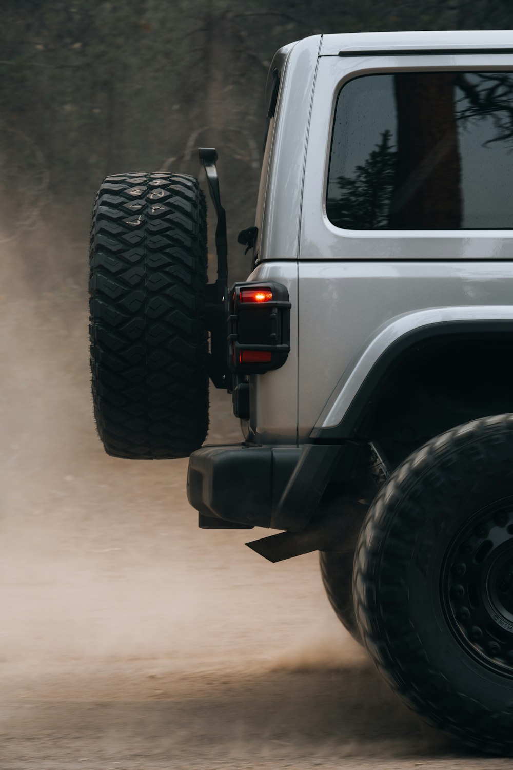 white suv on gray concrete road