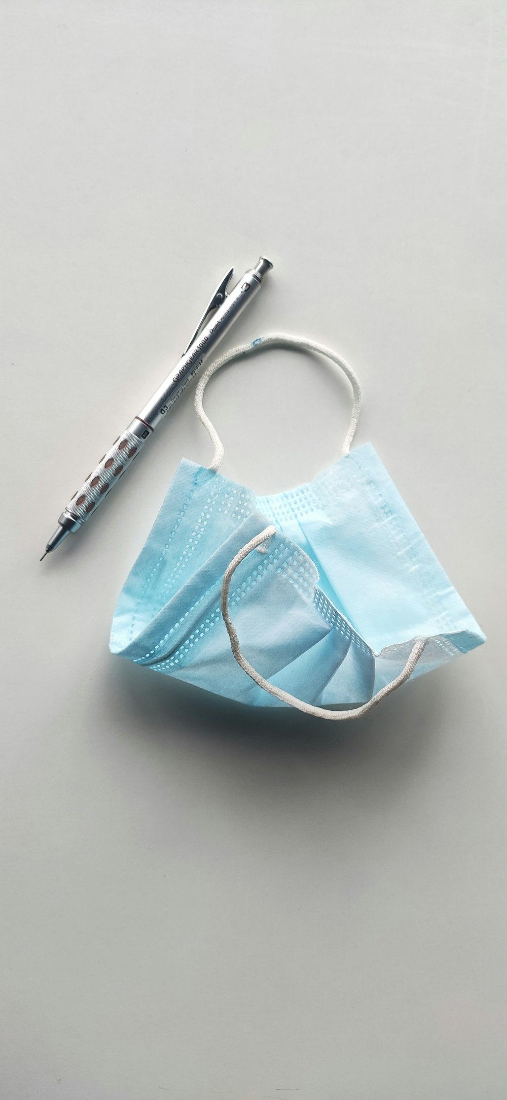 white and blue tote bag