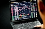 black laptop computer turned on displaying game application