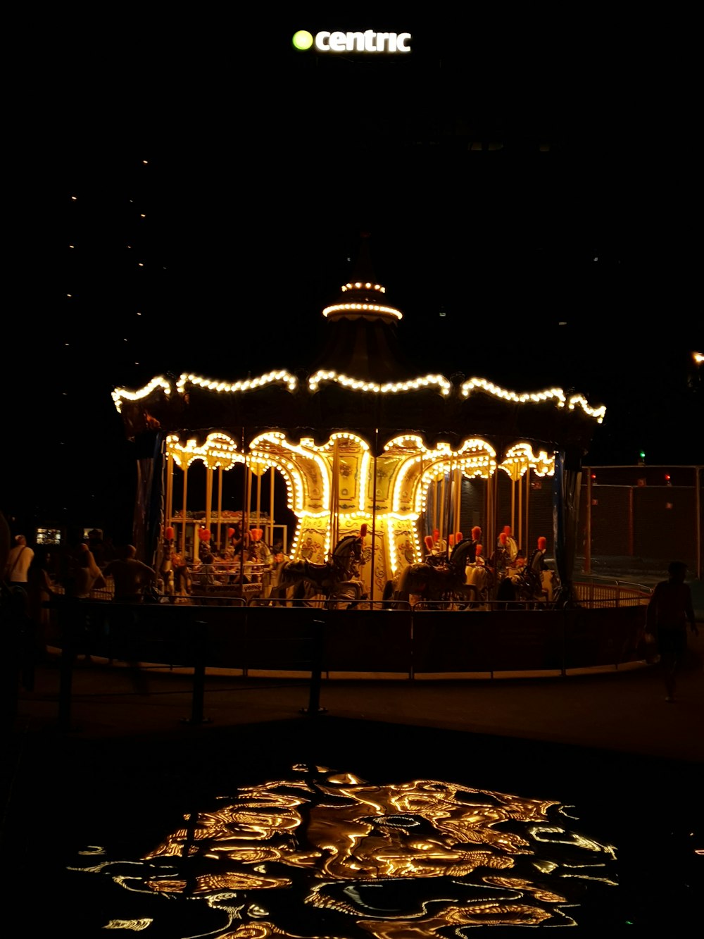 lighted carousel during night time