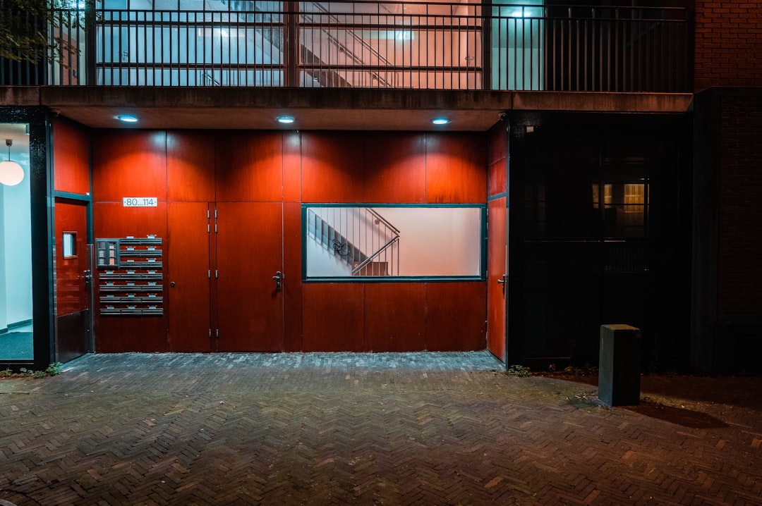 brown wooden door with glass panel