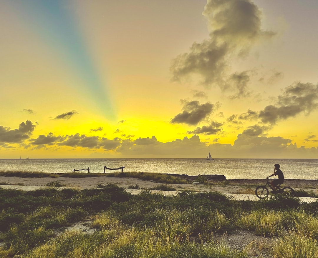 Sunset and blue sky stripes on Aruba island. 