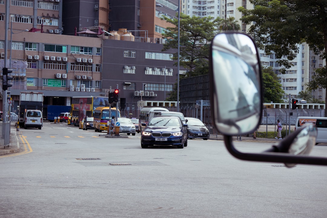 cars parked on side of the road during daytime