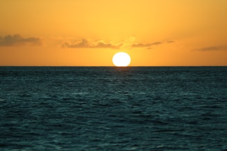 sun setting over the ocean