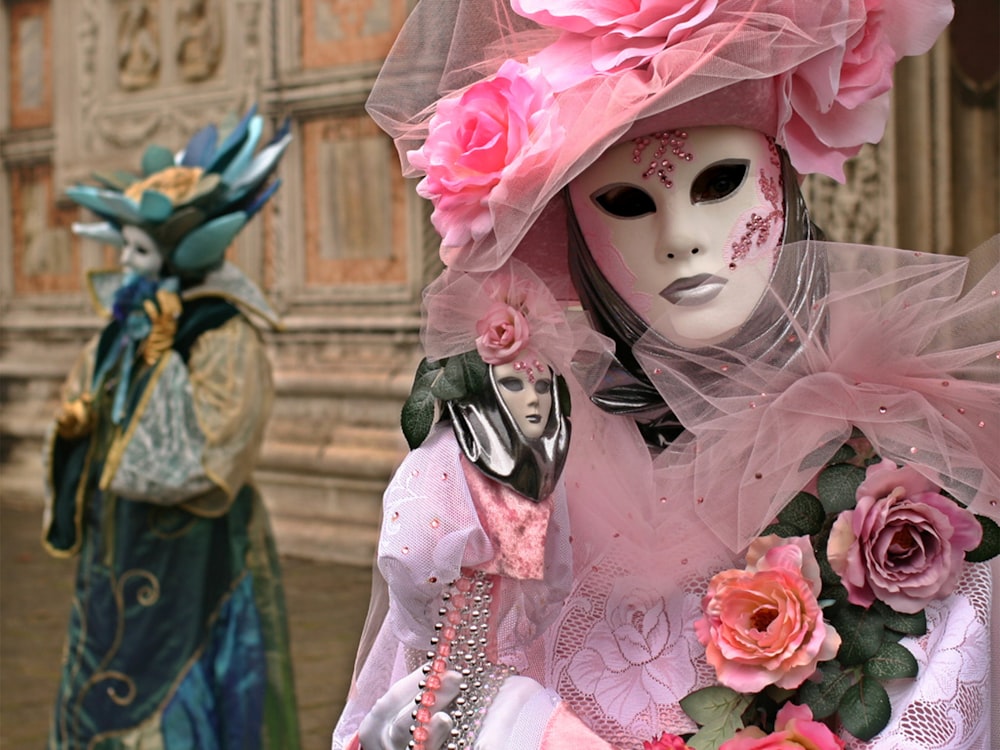 person wearing pink and white mask