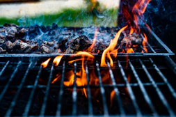 burning fire on charcoal grill