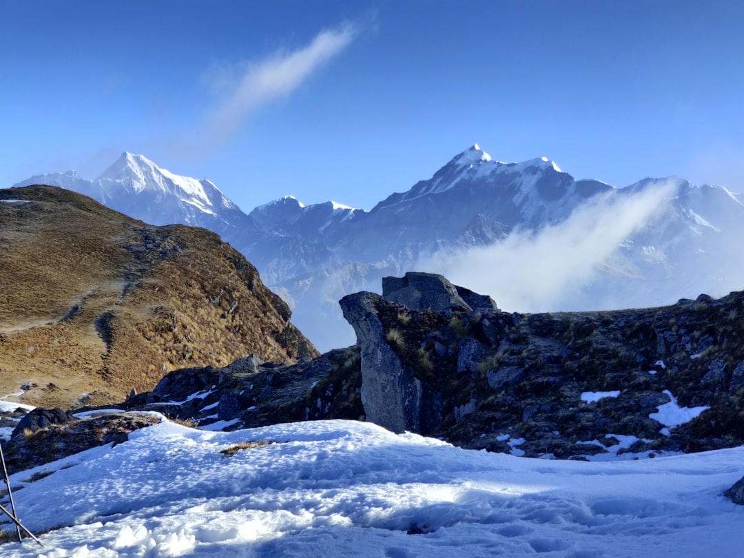 snow covered mountain under blue sky during daytime