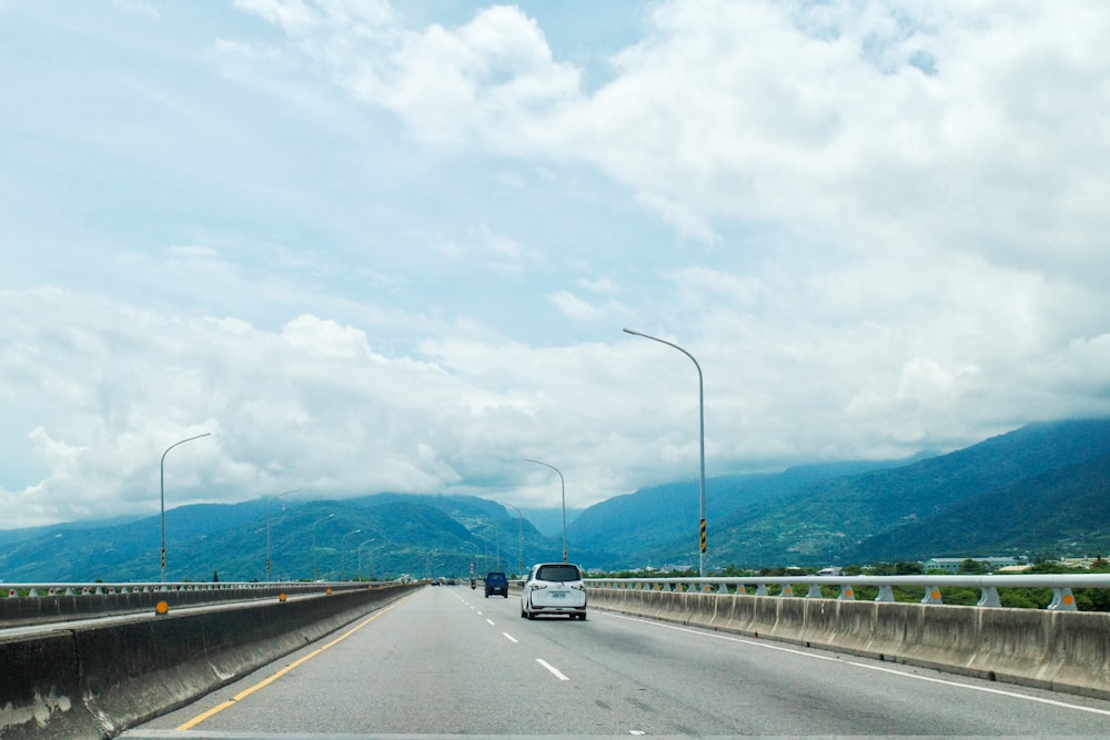 white car on road during daytime