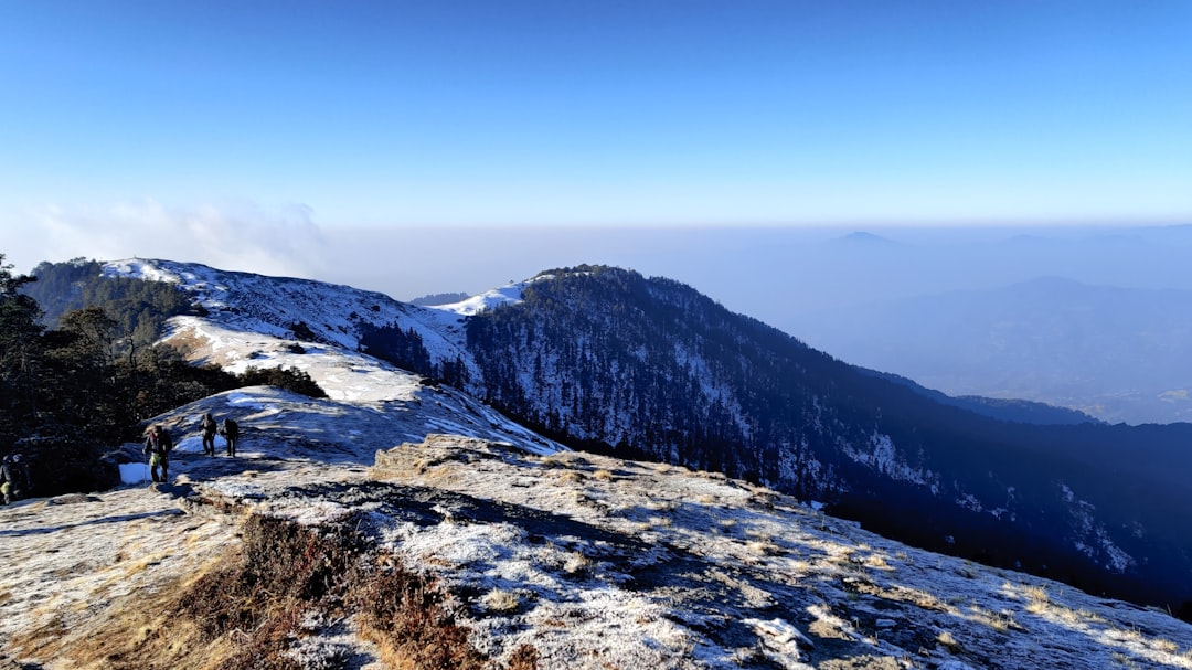 snow covered mountain under blue sky during daytime