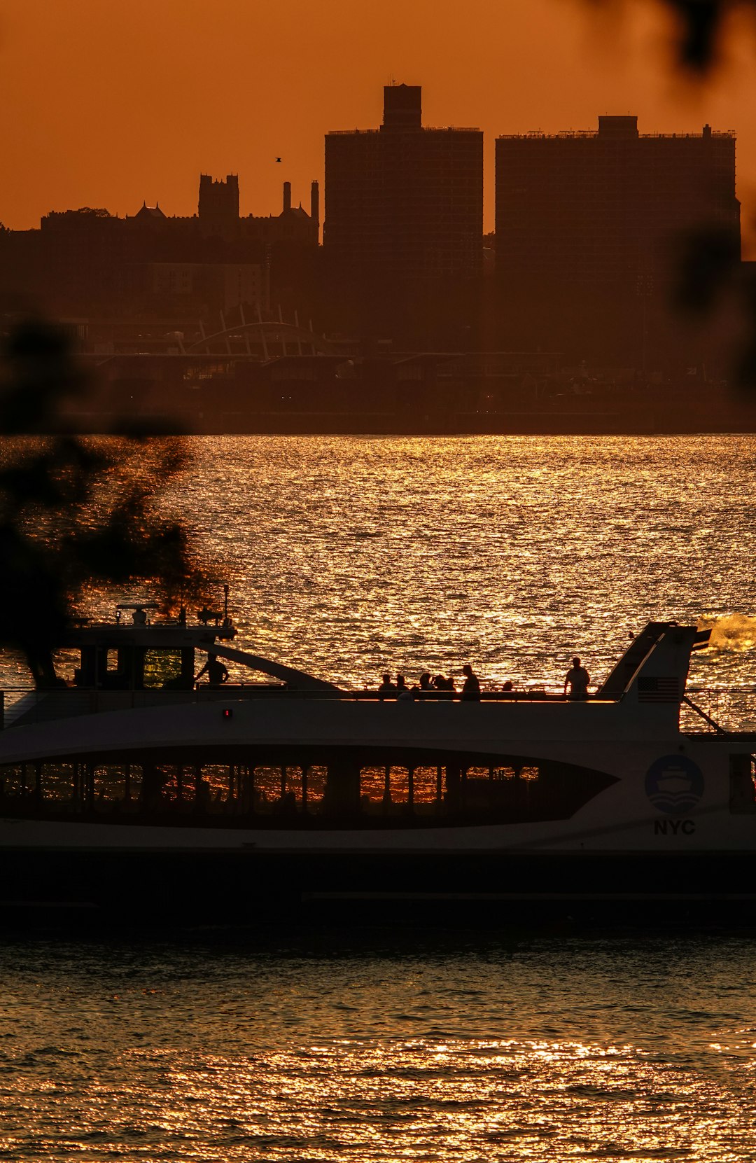 white and black passenger plane on dock during sunset