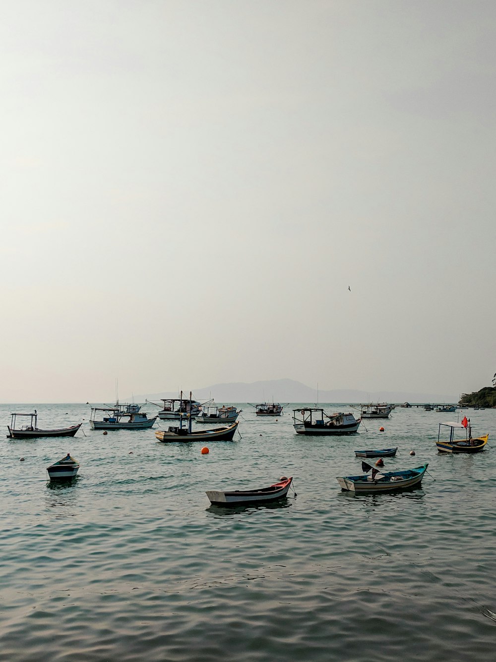 boats on sea during daytime