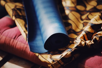 blue thread on brown and beige textile