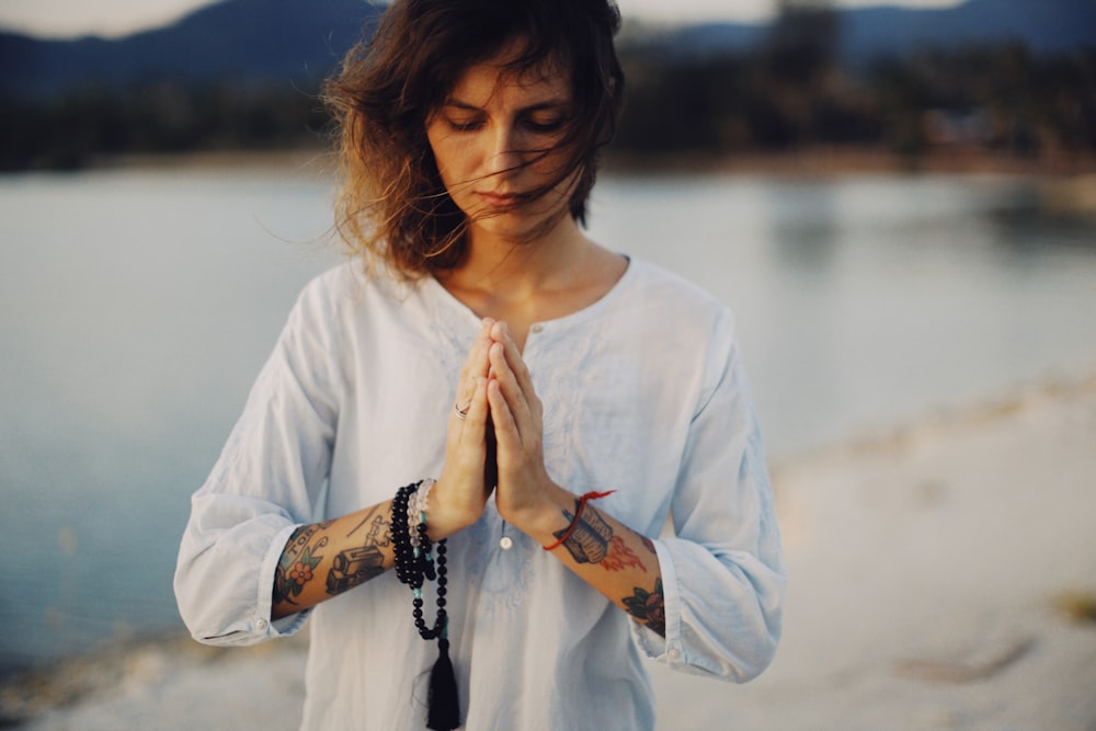 woman in white long sleeve shirt