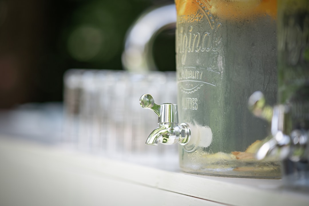 clear glass mug with beer