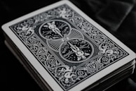 A close-up of a poker card deck featuring unique artwork.