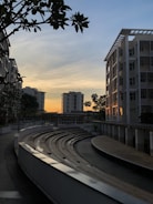 Outdoor garden area with amphitheater seating and people enjoying an evening event
