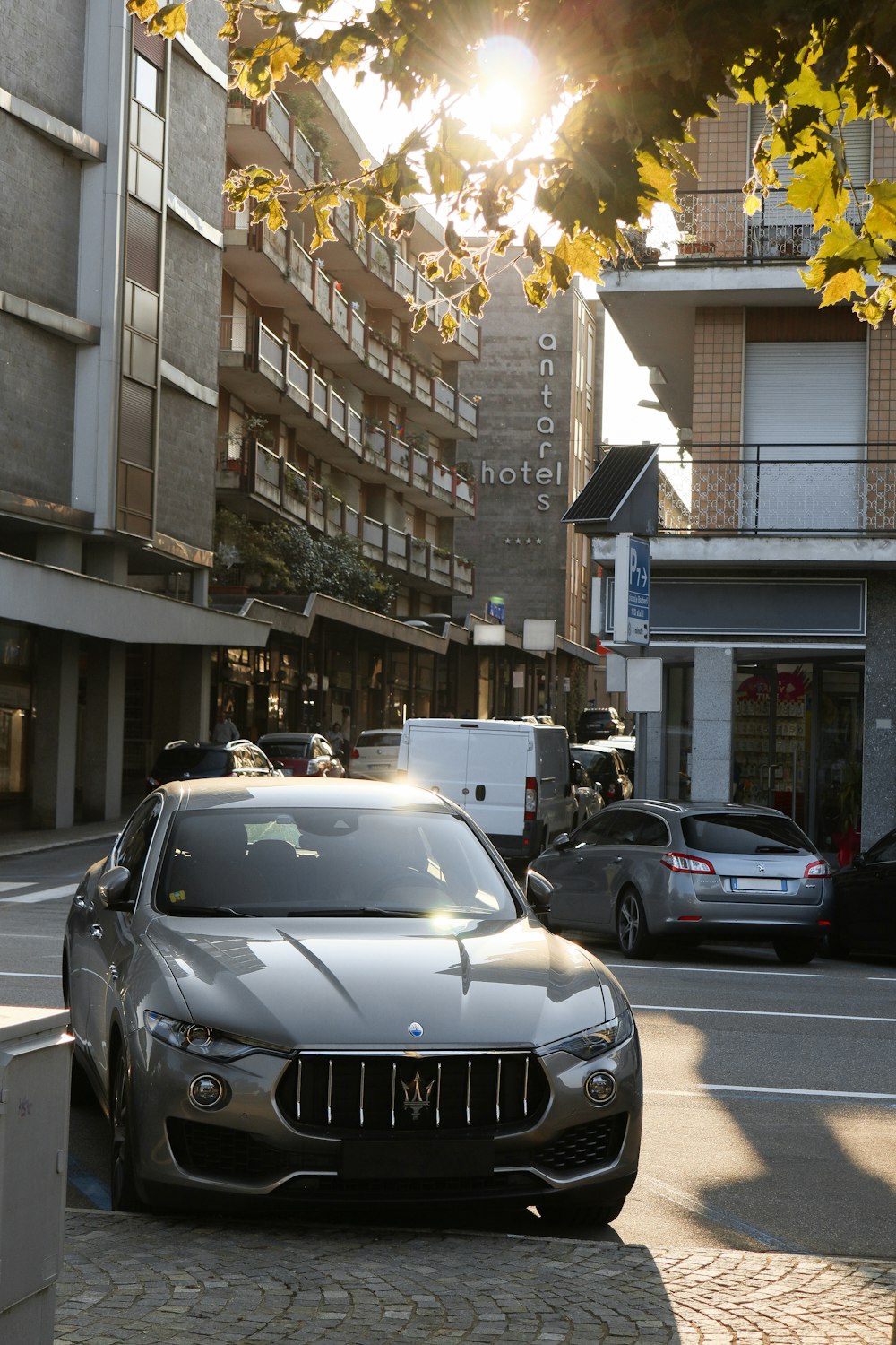 black bmw m 3 parked on street during daytime