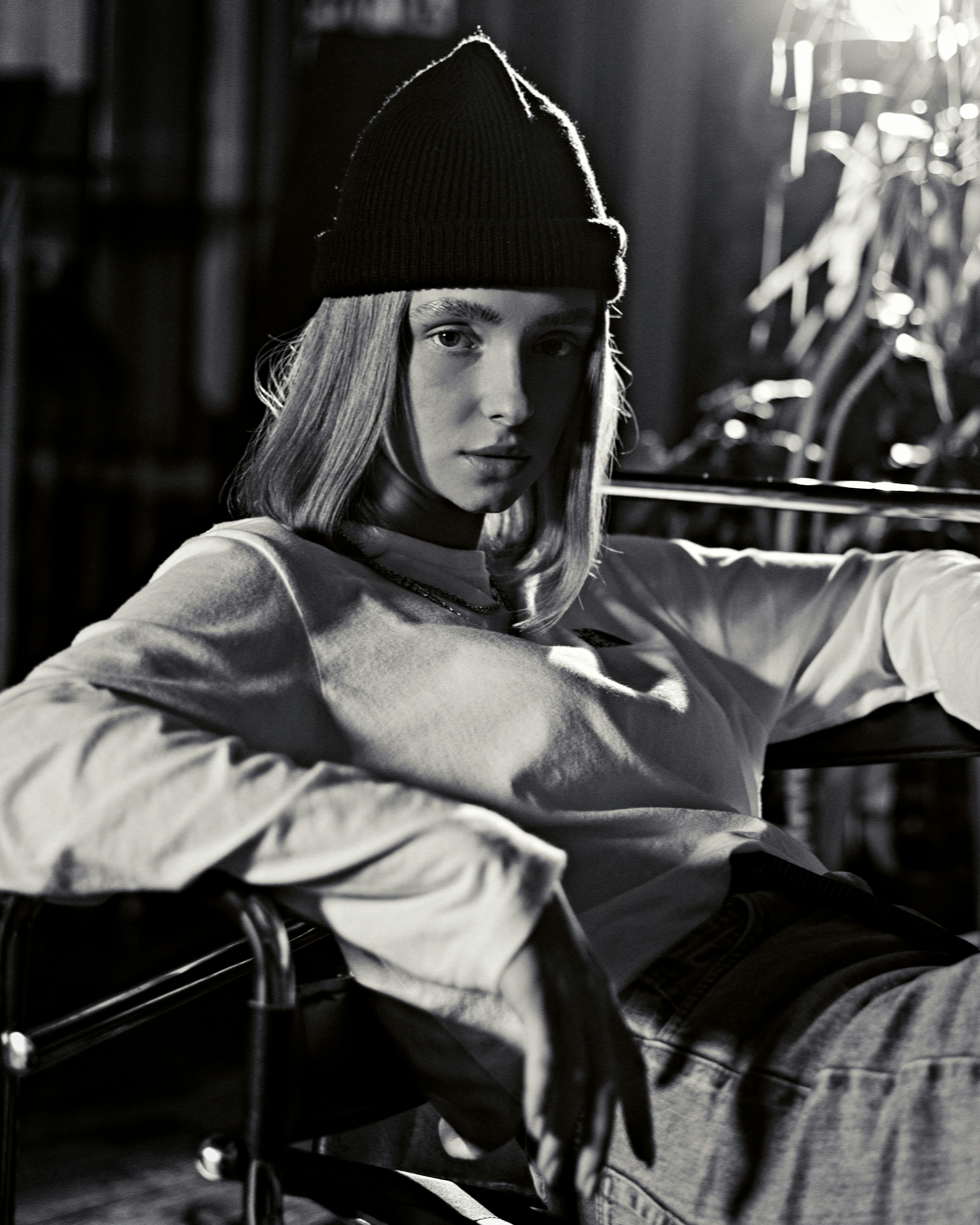 woman in black knit cap and gray long sleeve shirt