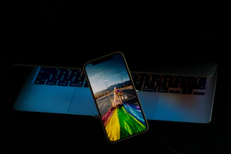 A smartphone displaying a vibrant social media ad in action.