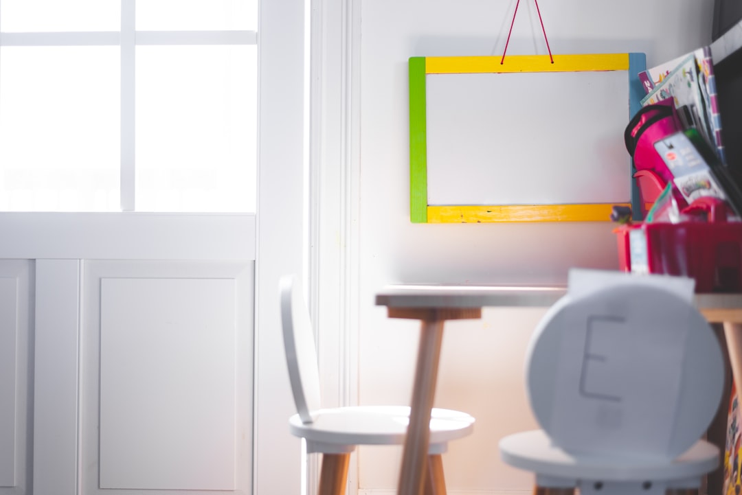 brown wooden chair beside white wooden table