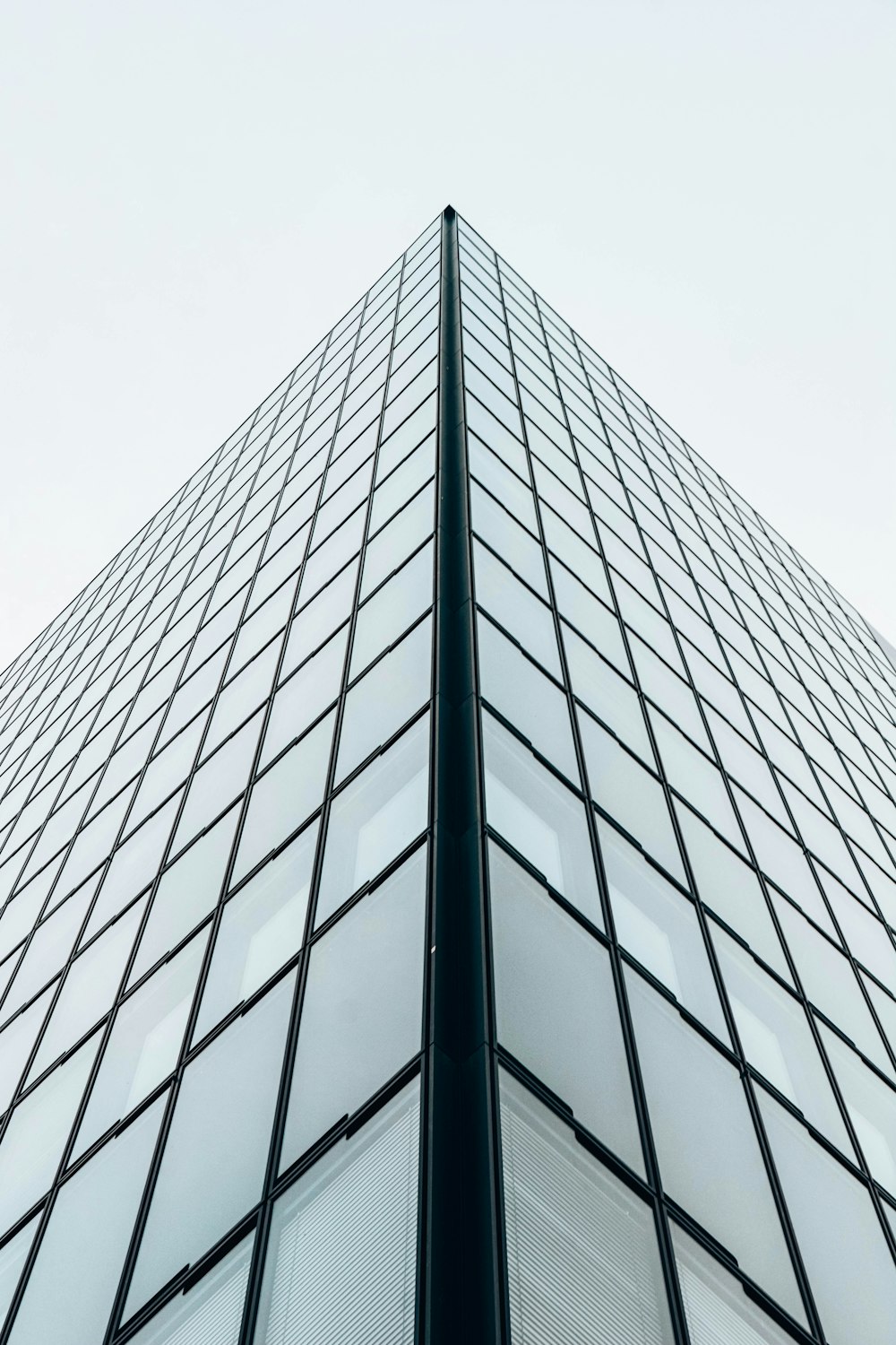 low angle photography of glass building