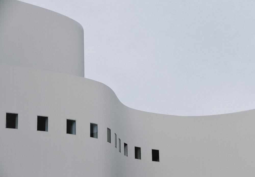 gray concrete building under white sky during daytime