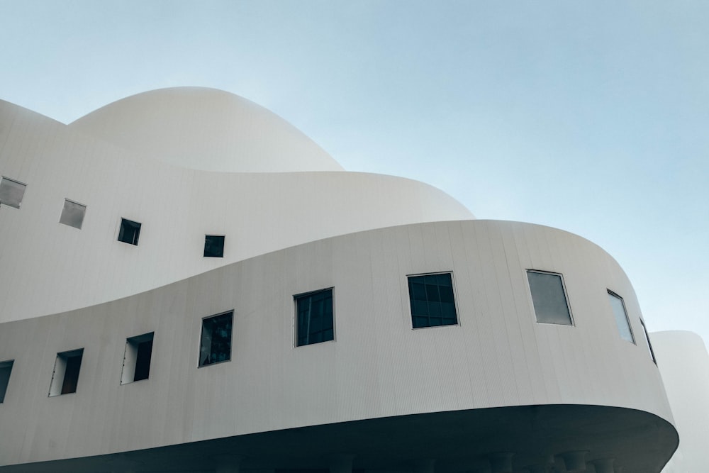 white concrete building under blue sky during daytime