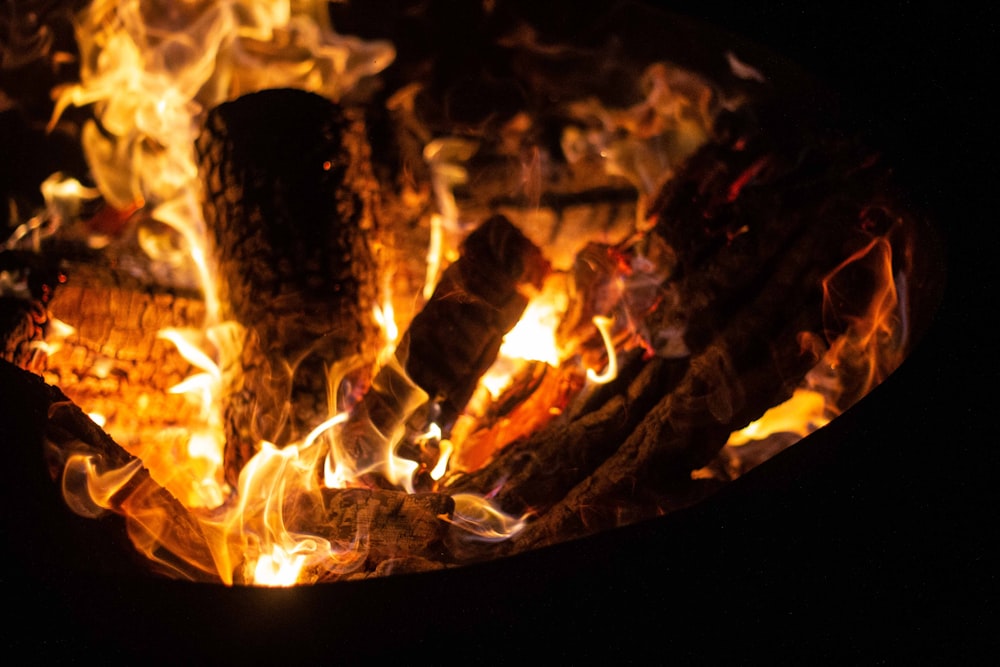 fire in black round fire pit