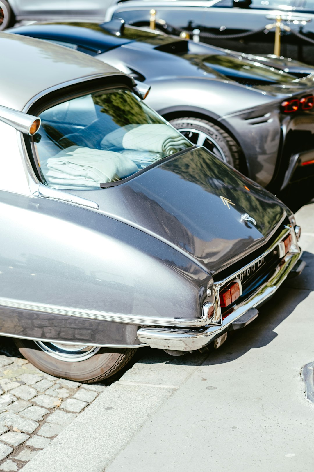 grey car on grey concrete road