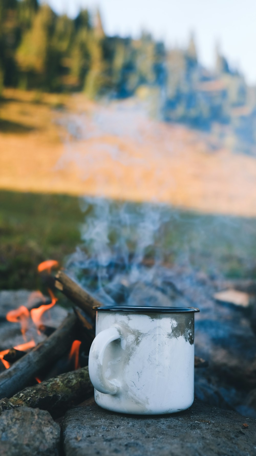 white ceramic mug on fire