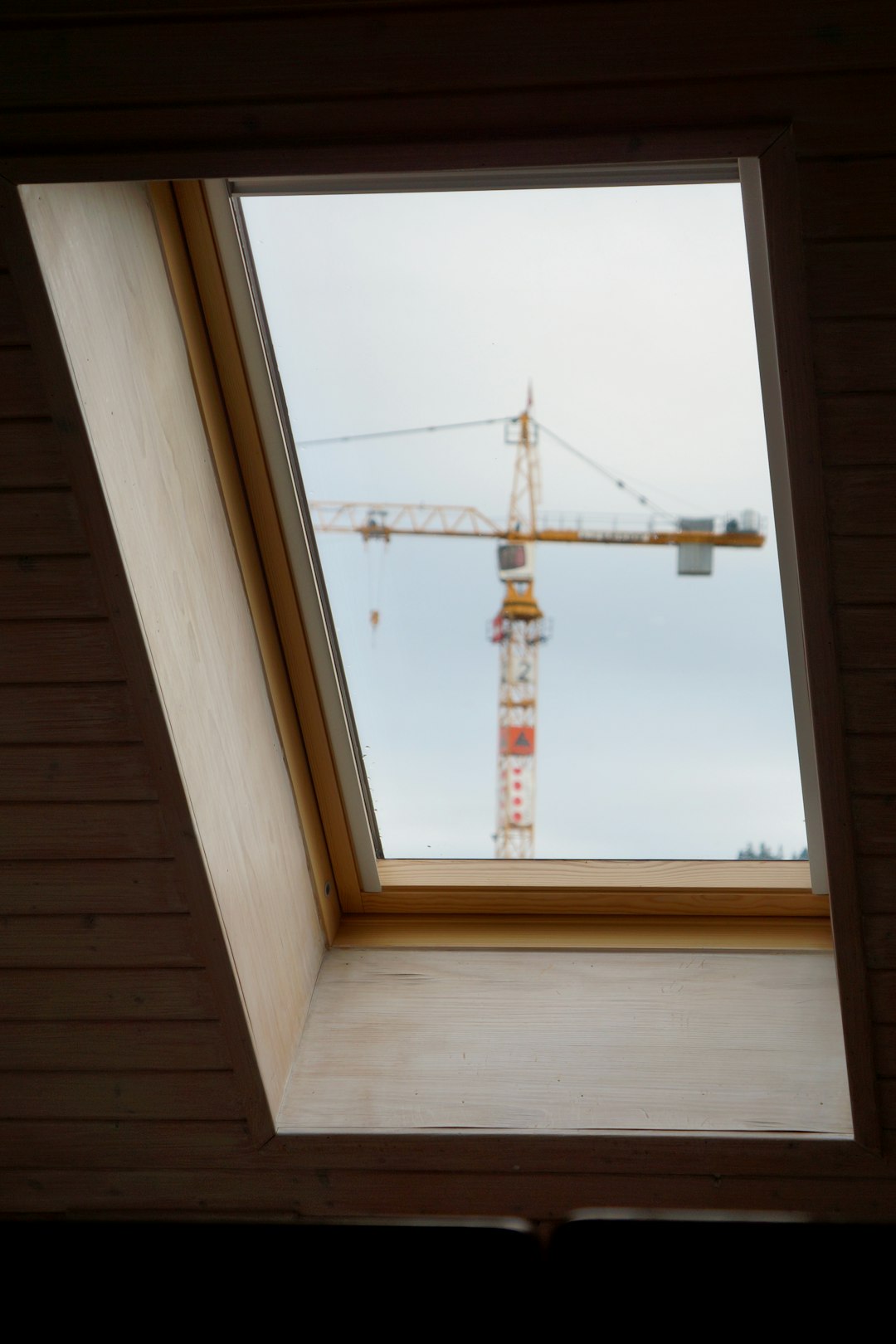 brown wooden framed glass window