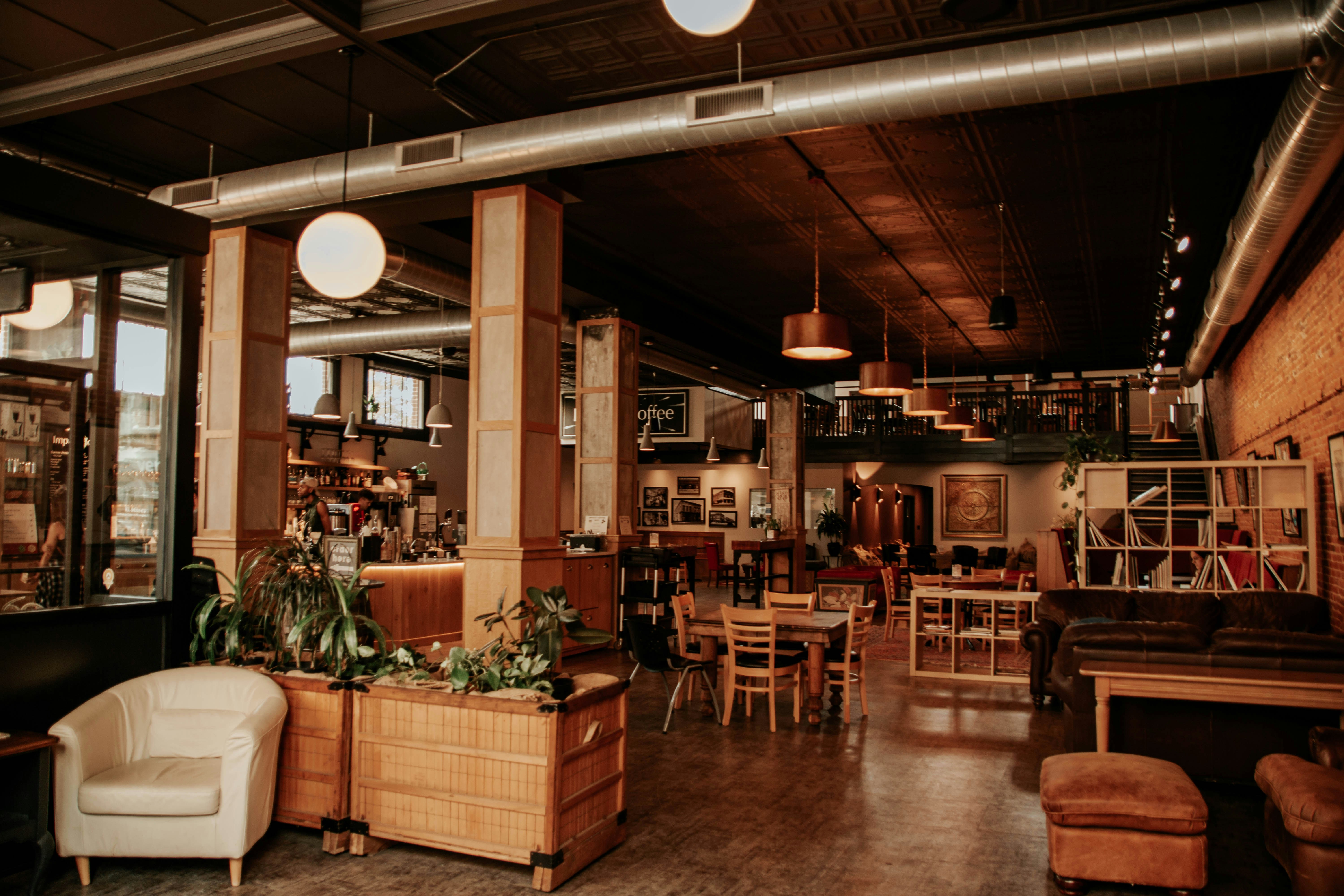 brown wooden chairs and tables