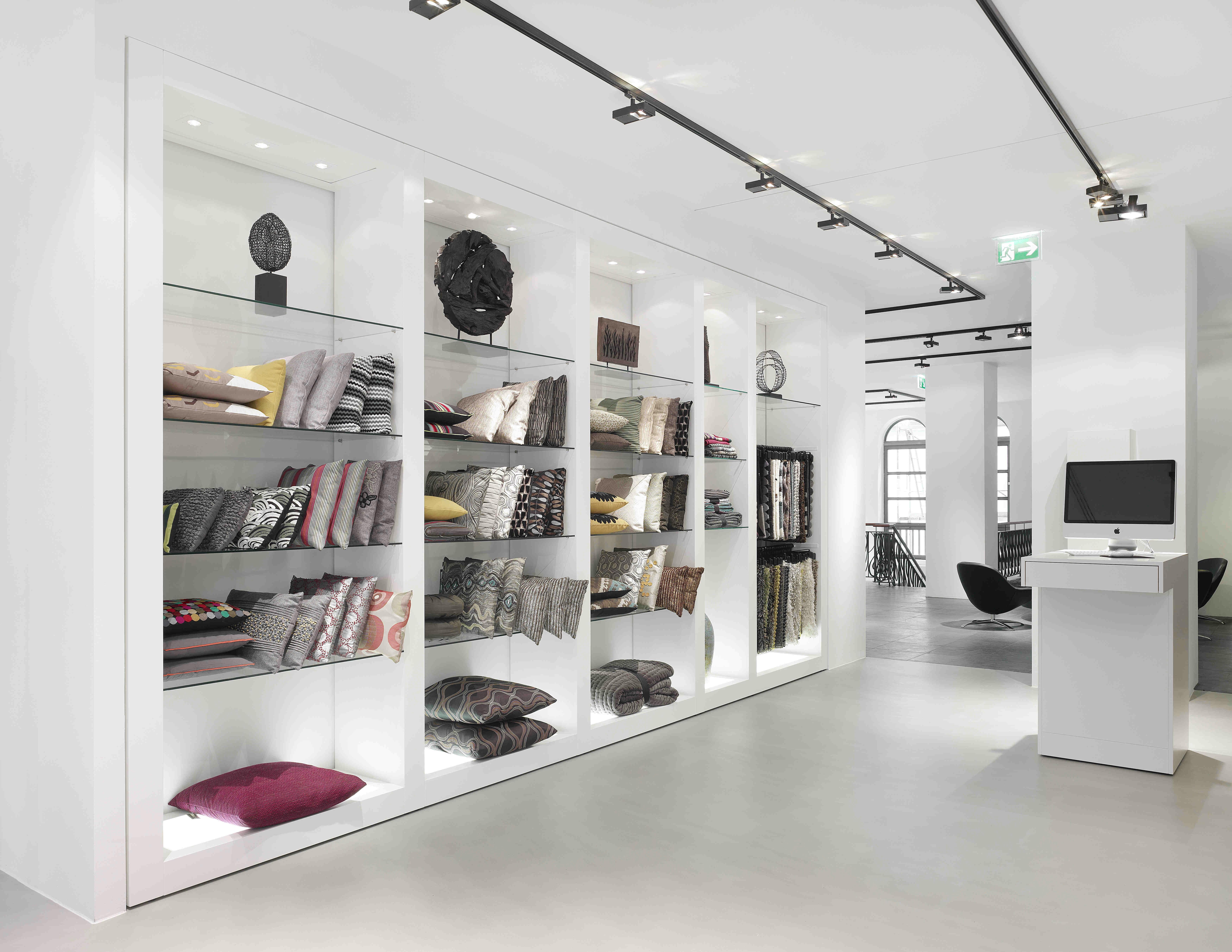 white wooden shelf with books and books