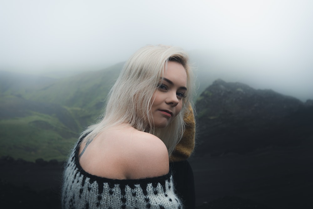 woman in black and white knit sweater