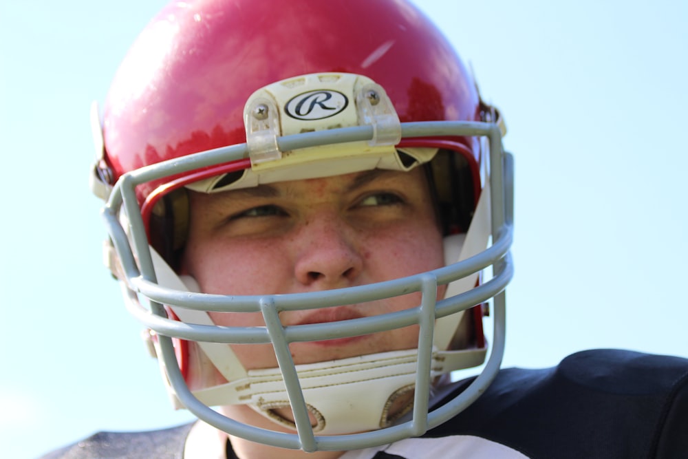 man in red helmet and helmet