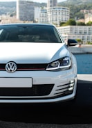 white mercedes benz car on road during daytime